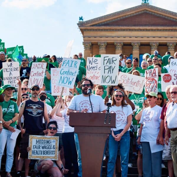 Adam Rizzo speaks at a rally in front of the museum in July 2022. Via the @PMA_Union Twitter.