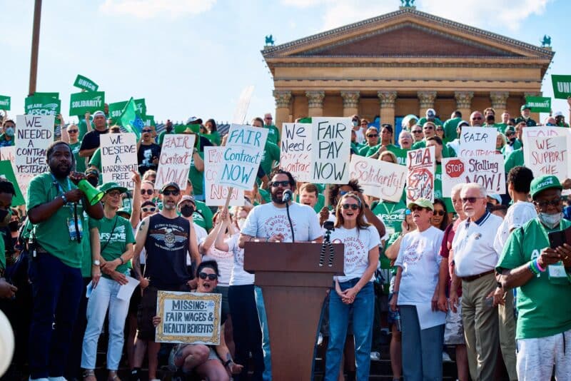 Adam Rizzo speaks at a rally in front of the museum in July 2022. Via the @PMA_Union Twitter.